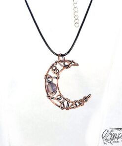 pendentif ruis - demie lune en cuivre avec sa perle en fluorite