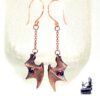 boucles d'oreille ailes de dragon avec grenat