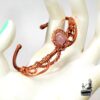 bracelet jonc eludril en cuivre et perle en quartz rose