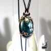 Pendentif Elros en agate mousse serti cuivre