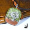 Pendentif orgone orgonite peridot et arbre de vie