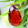 Pendentif Iriel grenat taillé