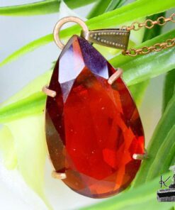 Pendentif Iriel grenat taillé