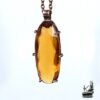 Pendentif geliel en cuivre avec citrine taillée
