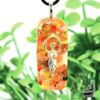 Pendentif orgone orgonite Tanit en agate rouge et cuivre