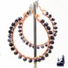 Boucles d'oreille créoles en cuivre et perles noires