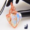 Pendentif henora en cuivre et un coeur en opalite aurora