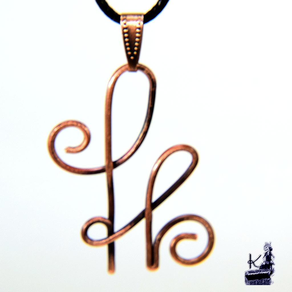 Pendentif Zibu - asi ( authenticité )
