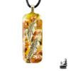 Pendentif Orgonite Jana en résine avec pierre de Pietersite, plumes et copeaux de cuivre.