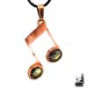 Pendentif artisanal en cuivre en forme de note de musique serti de deux pierres de labradorite, création Le Trésor des Korriganes.