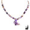 Collier artisanal Le Trésor des Korriganes composé d'un pendentif papillon en améthyste violette et d'un montage en cuivre.