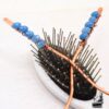 Duo d'épingles à cheveux artisanales en cuivre martelé ornées de pierres d'aigue-marine bleue