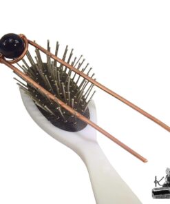 Fourche à cheveux artisanale en cuivre naturel avec pierre d'obsidienne noire, design mystique.