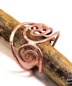 Bague ajustable Dallan en cuivre naturel, bijou artisanal unique inspiré d'une légende amazonienne.