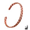 Bracelet jonc Glynis en cuivre torsadé à la main, bijou artisanal inspiré par la légende de l'Île au Trésor.