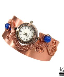 Bracelet montre artisanal Lira en cuivre naturel tressé avec perles de cyanite, pièce unique.
